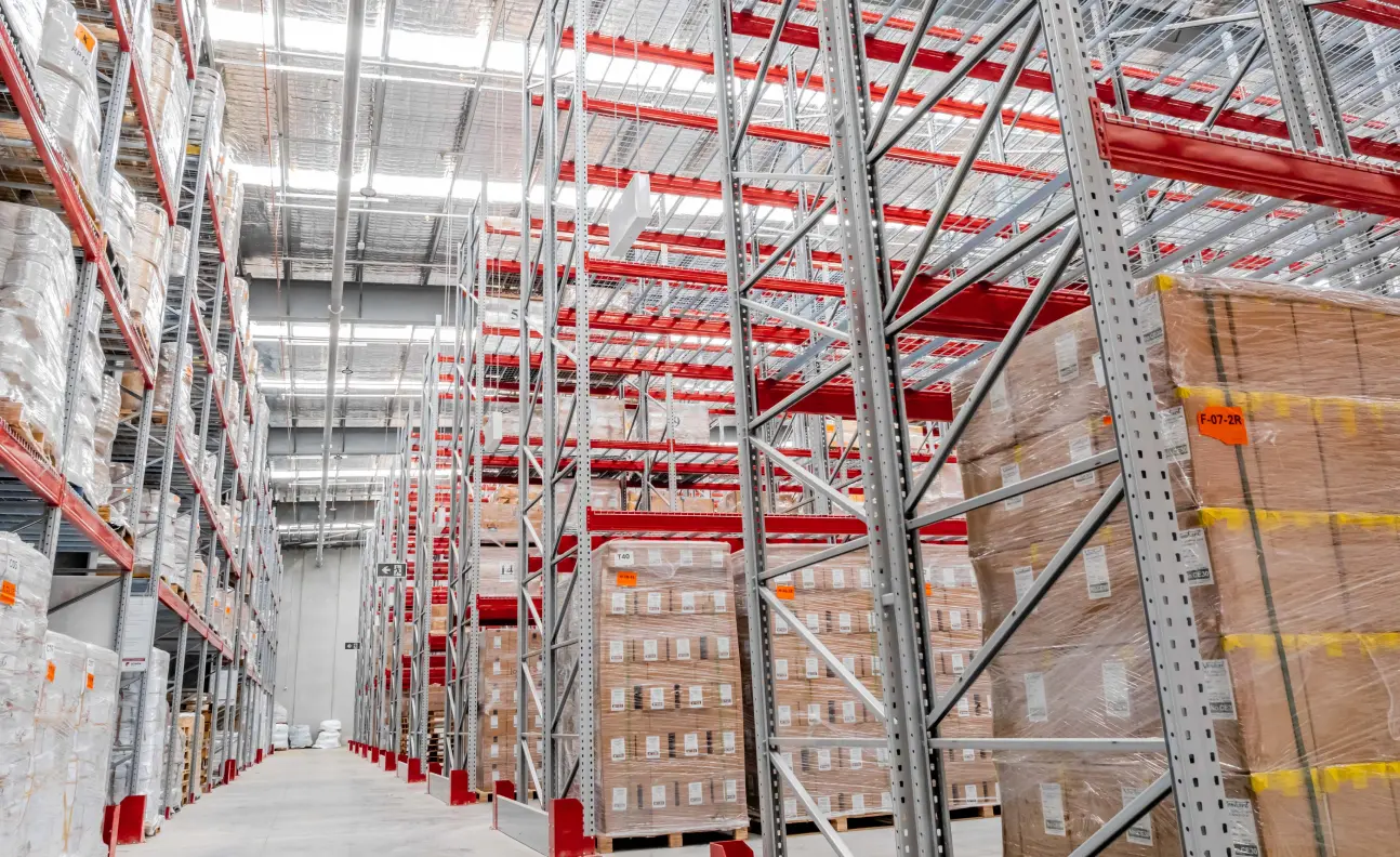 Standard single deep pallet racking system in warehouse with palletised goods storage